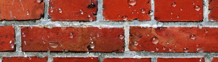 Impregneren van muur waterdruppels stoten af